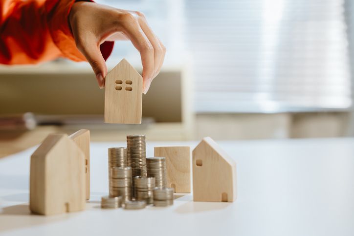 Saving money concept. Home investment saving house coin mortgage finance money property concept