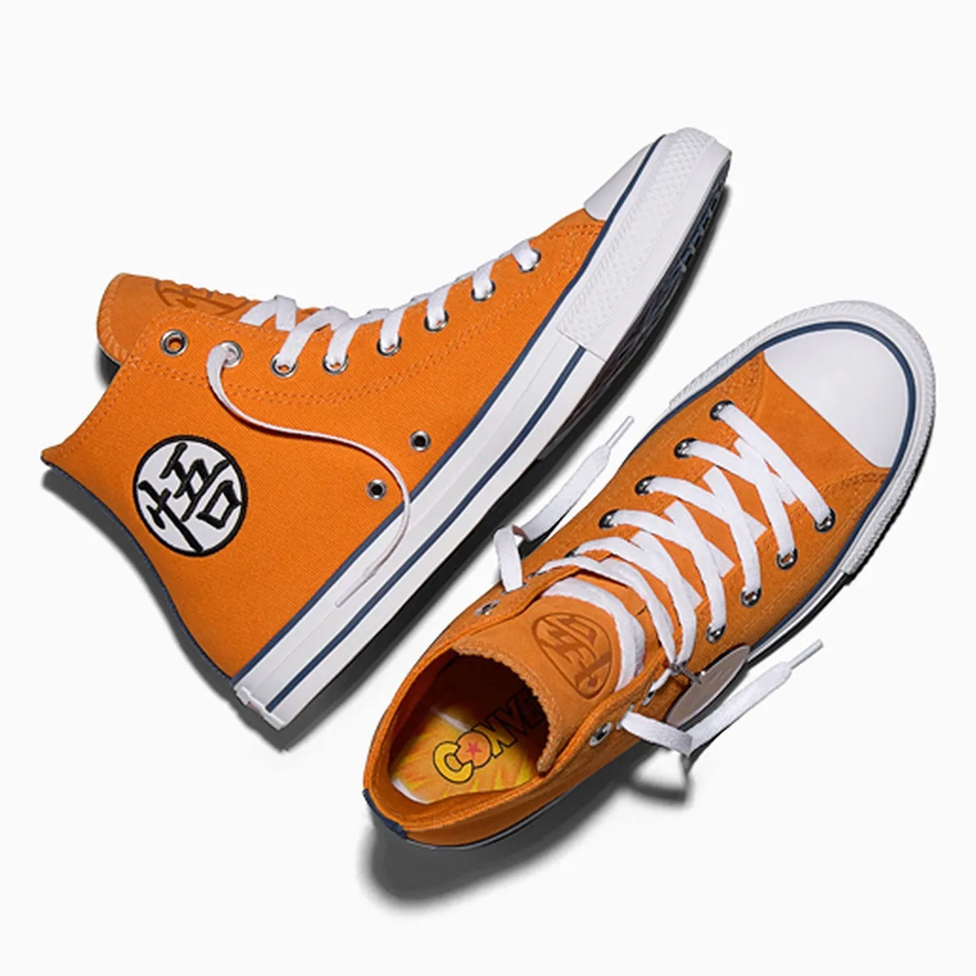 Orange high-top sneakers with white laces and soles, featuring a black logo on the side.