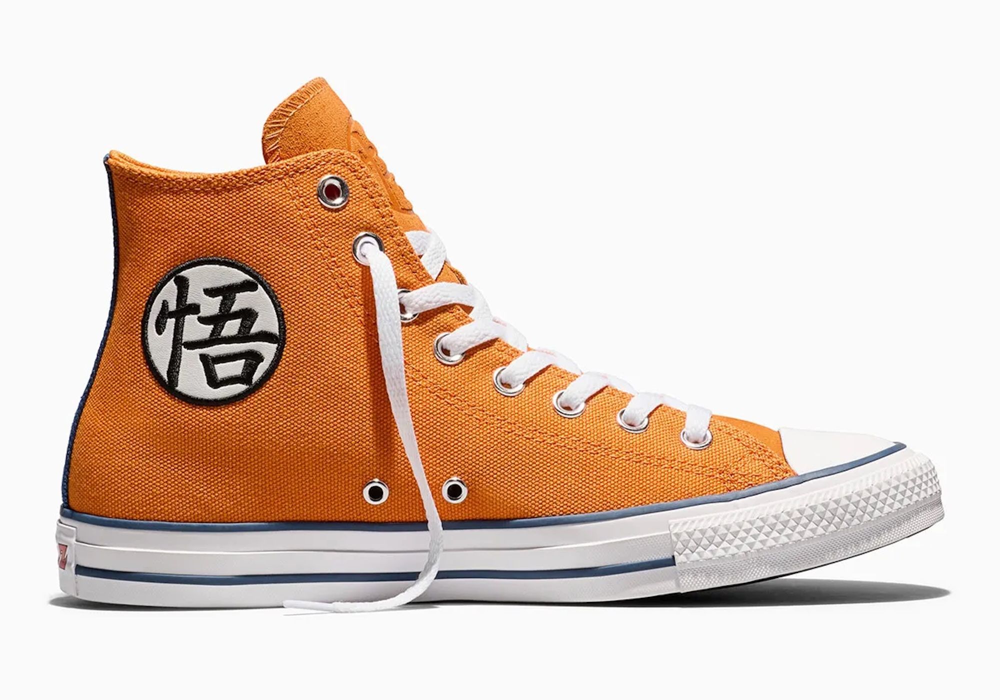 Orange high-top sneaker with black and white Converse logo and Japanese kanji symbol.