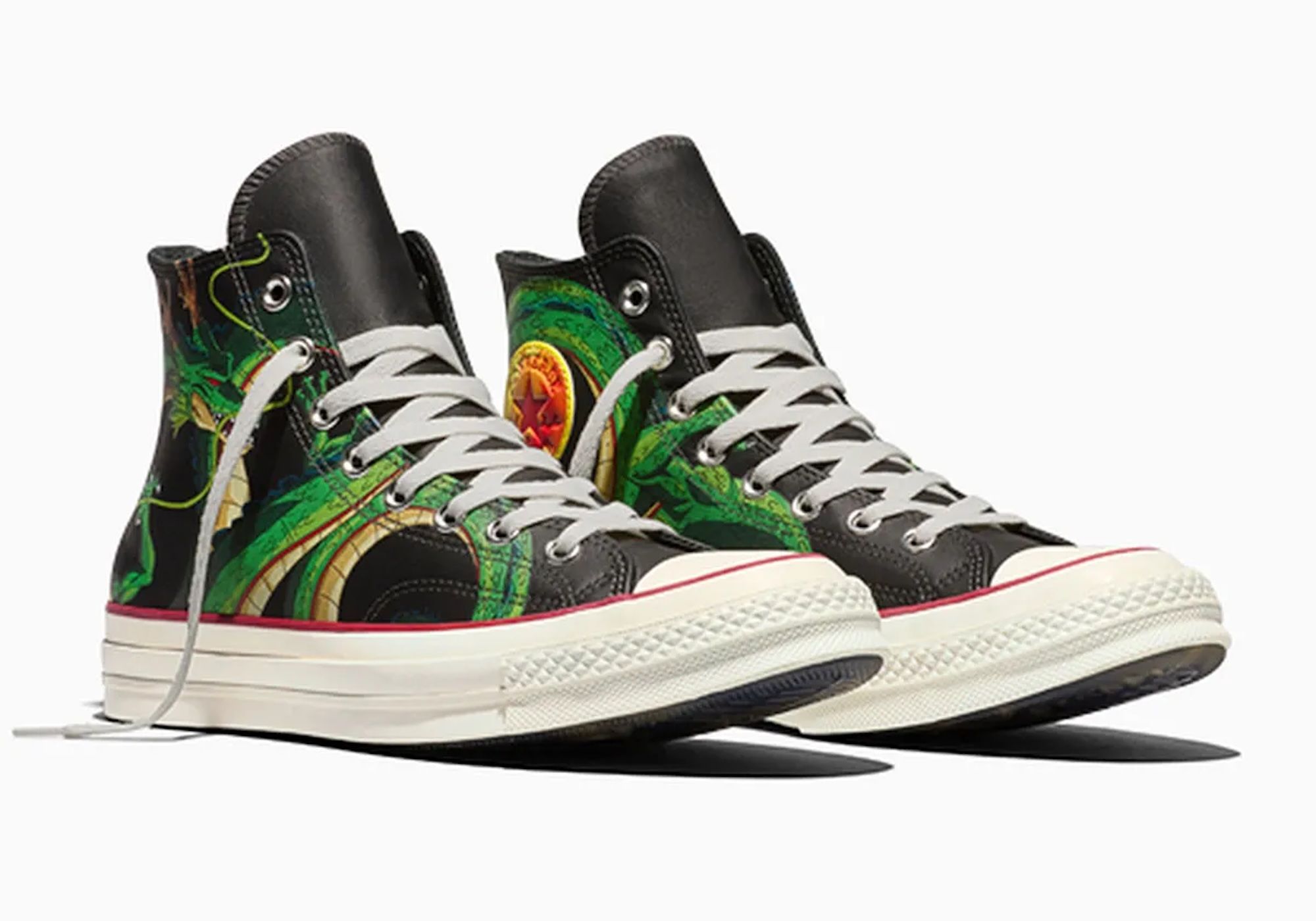 Pair of black and green high-top sneakers with colorful abstract patterns.