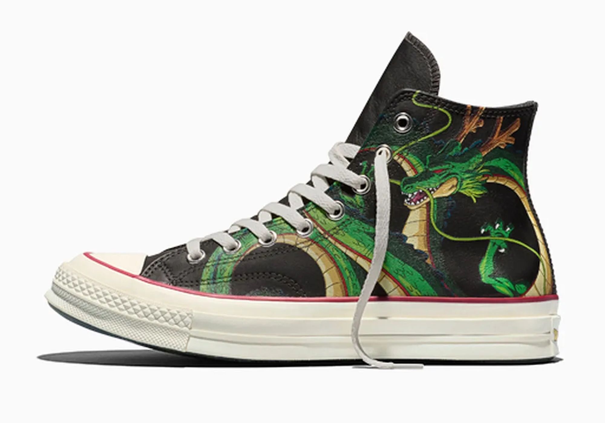 A black high-top sneaker with a vibrant green and yellow dragon design.