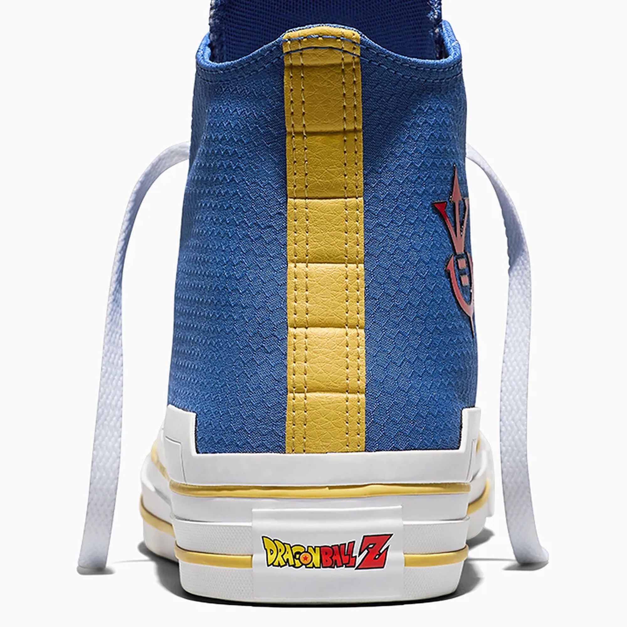 Close-up of a blue and yellow sneaker with the Dragon Ball Z logo.