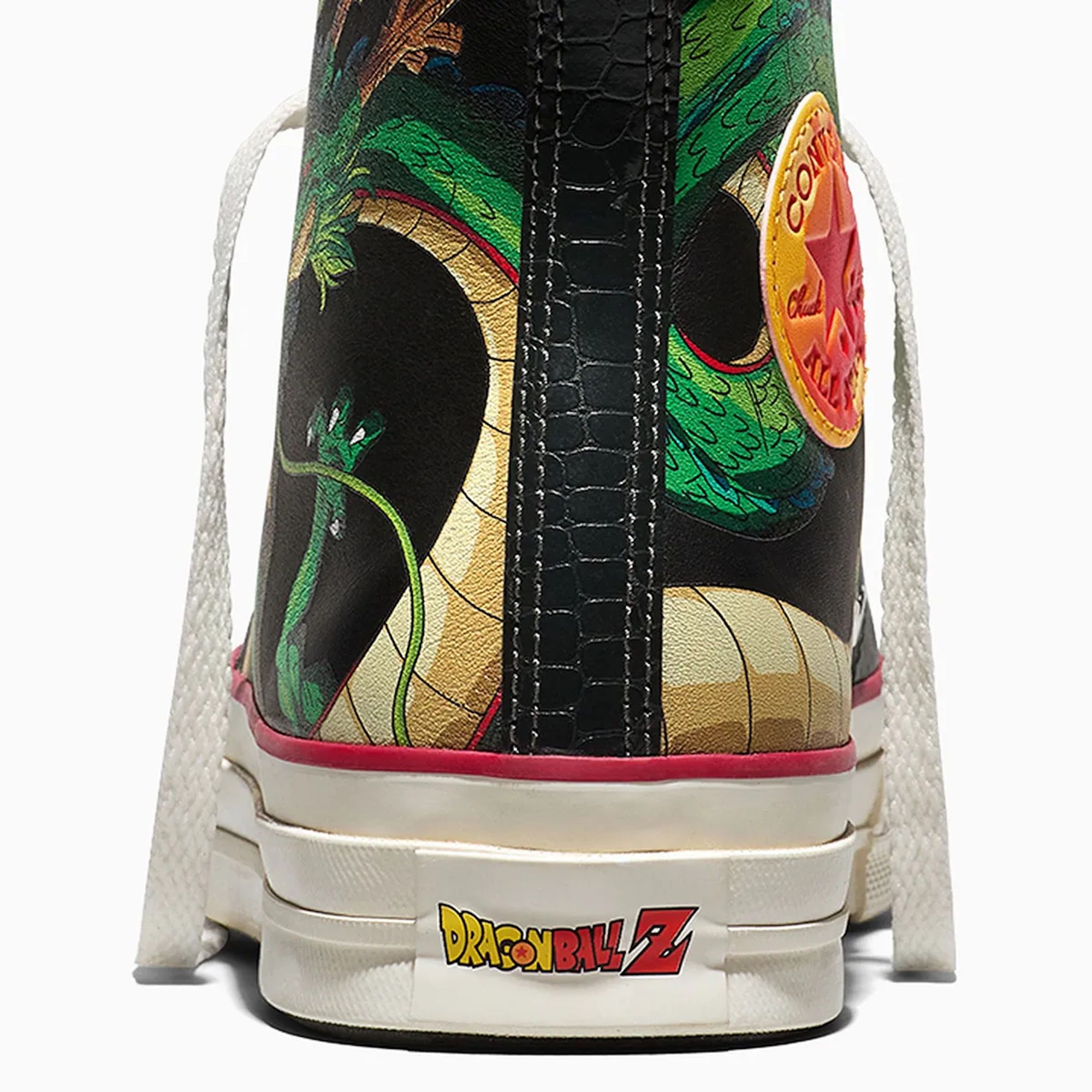 Colorful sneaker with Dragon Ball Z graphics, including the franchise logo, on a black background.
