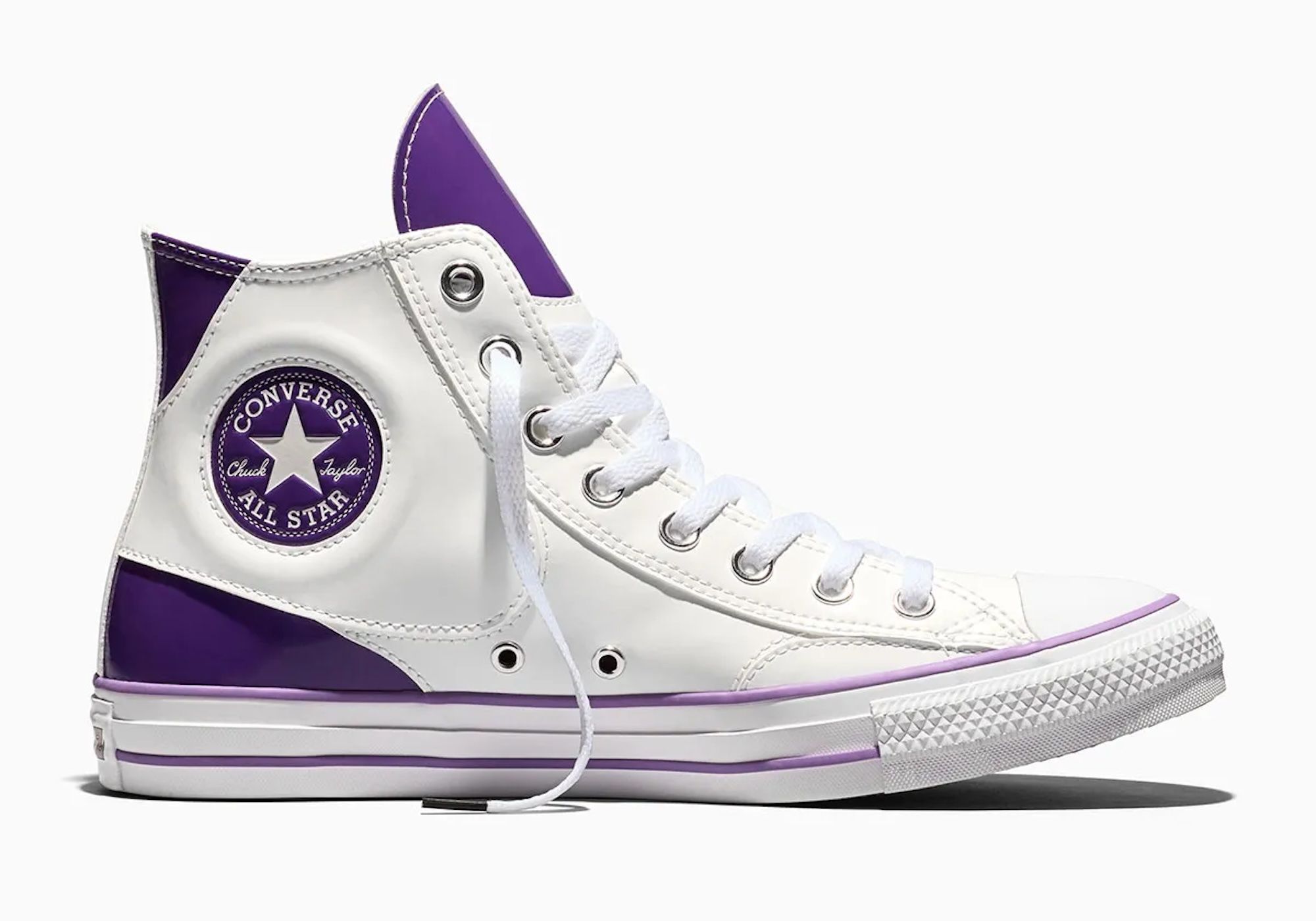 A white and purple high-top Converse All Star sneaker with the Converse logo on the side.