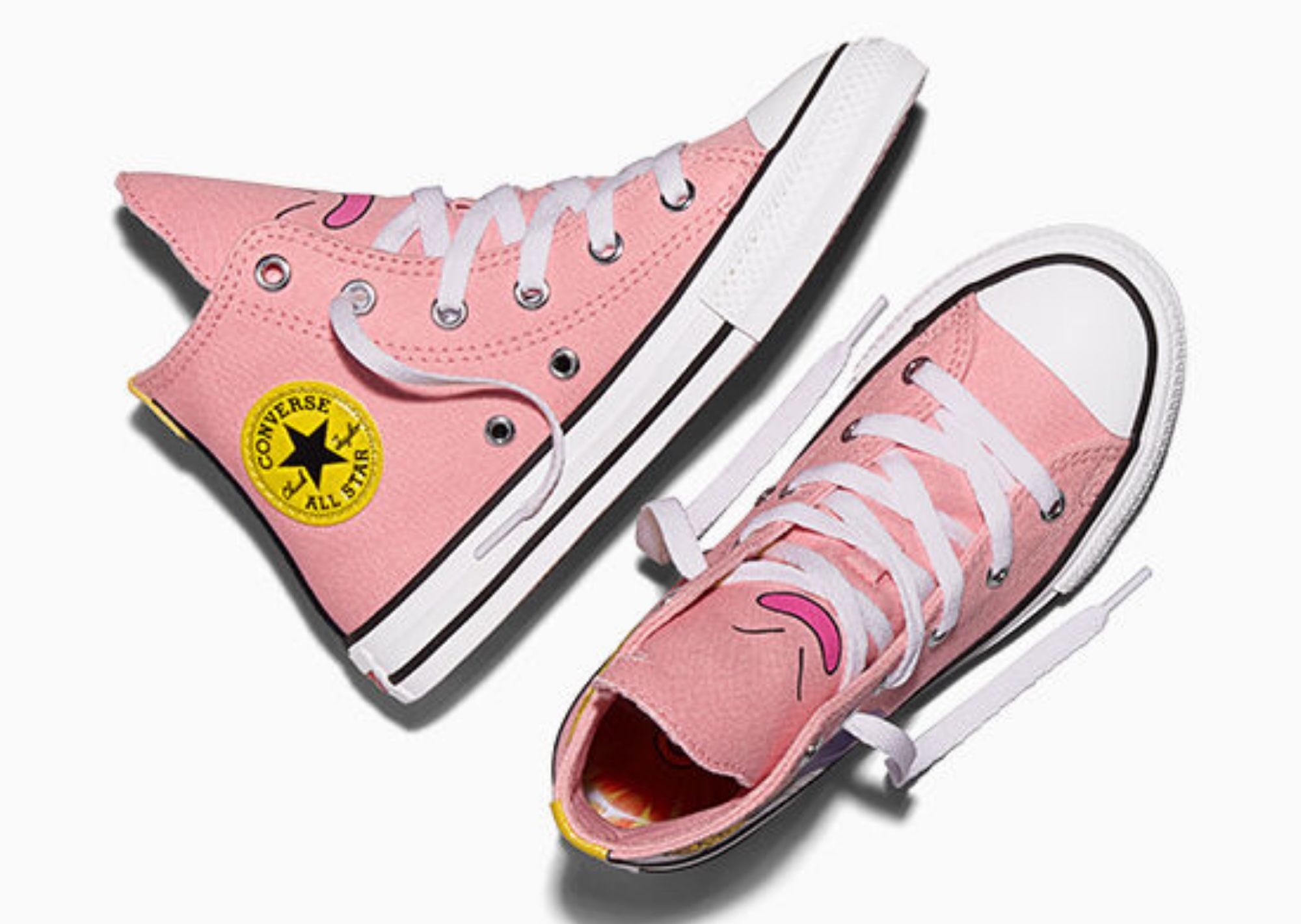 A pair of pink high-top Converse All Star sneakers with white soles and laces.